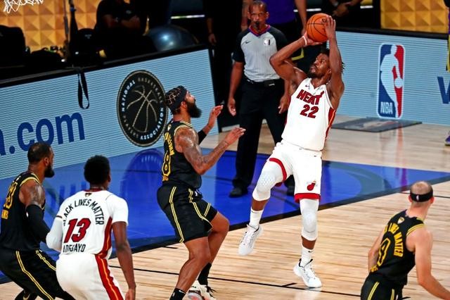 Miami Heat forward Jimmy Butler (22) shoots the ball against Los Angeles Lakers forward Markieff Morris (88) during the fourth quarter in game five of the 2020 NBA Finals at Advent Health Arena, Lake Buena Vista, Florida on October 9.  (Photo: Kim Klement-USA TODAY Sport Photo via Reuters)
